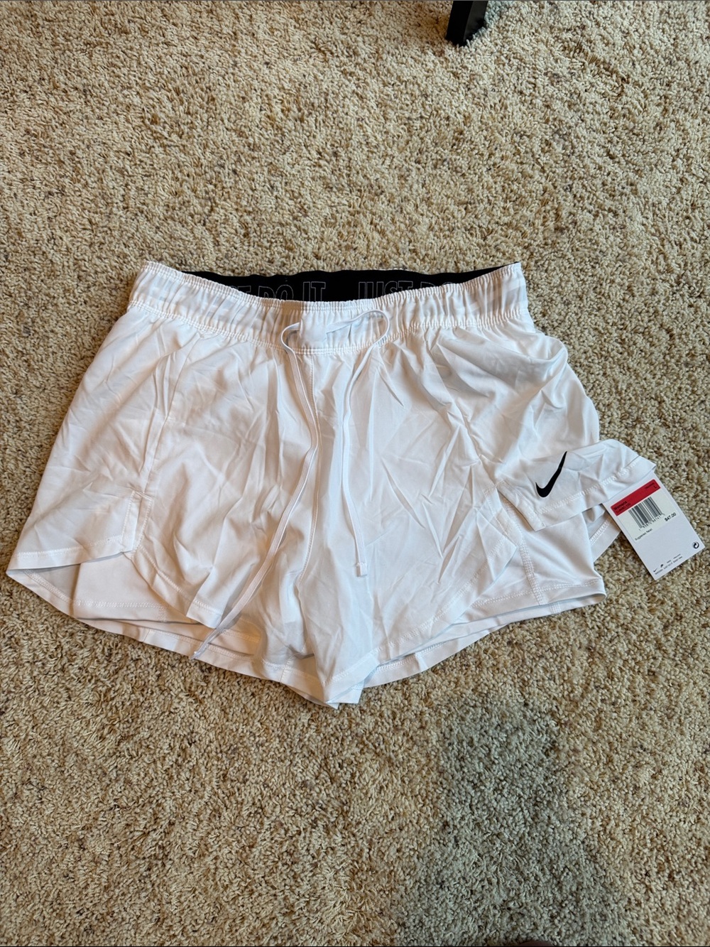 Nike Women's White Athletic Shorts with Black Waistband